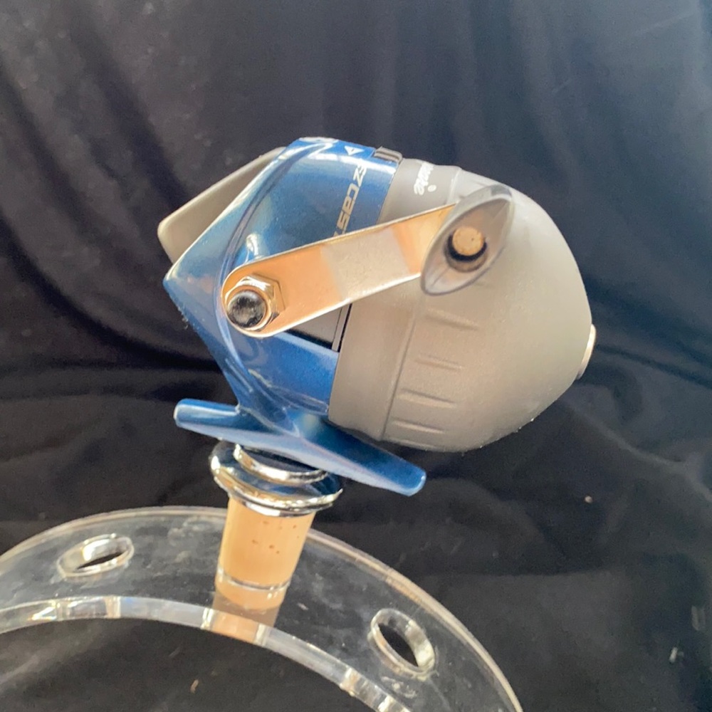 Fishing reel bottle stopper